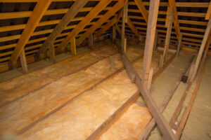 Insulated attic with wooden beams